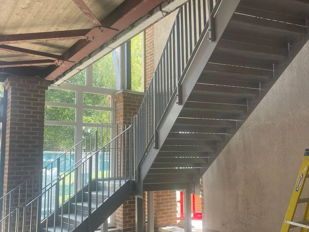 Steel staircase within a timber framed building
